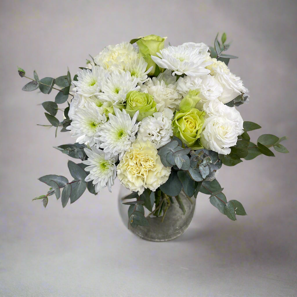 Simple Bouquet No. 01 with fresh white and green seasonal flowers in a rounded bouquet, approx. 25cm or 30cm wide.