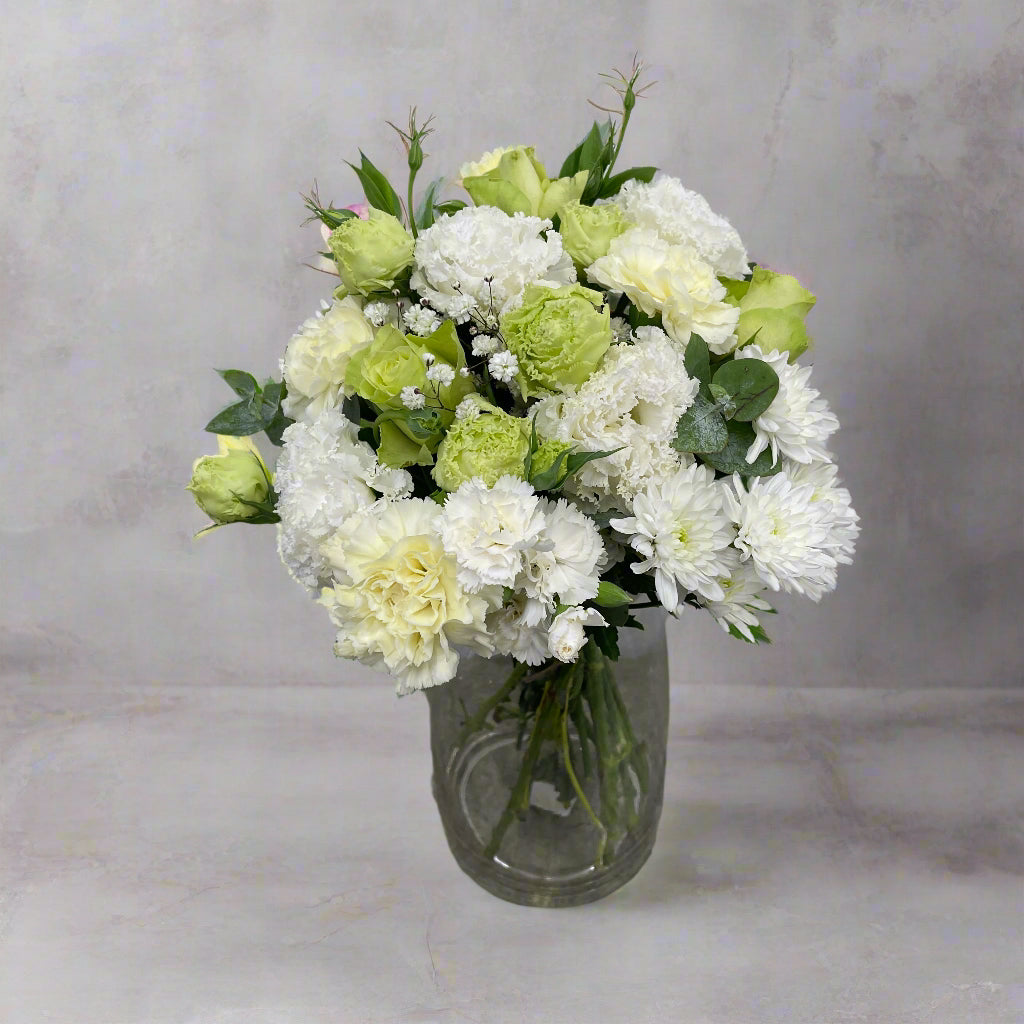 White and green flower bouquet from The Simple Collection 2025, fresh and natural.
