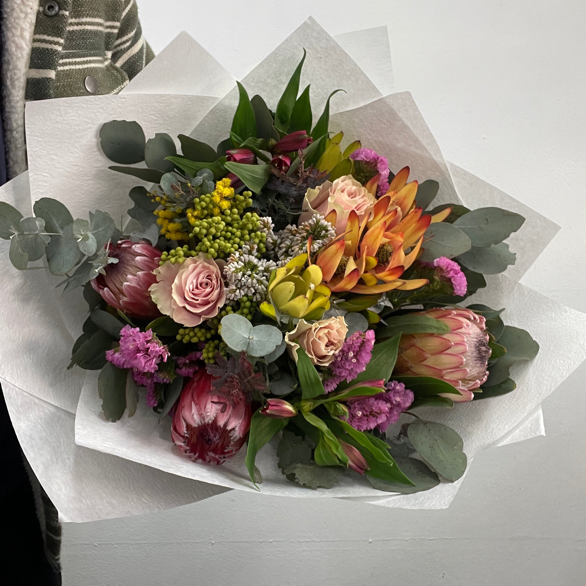Bouquet of flowers on a white surface