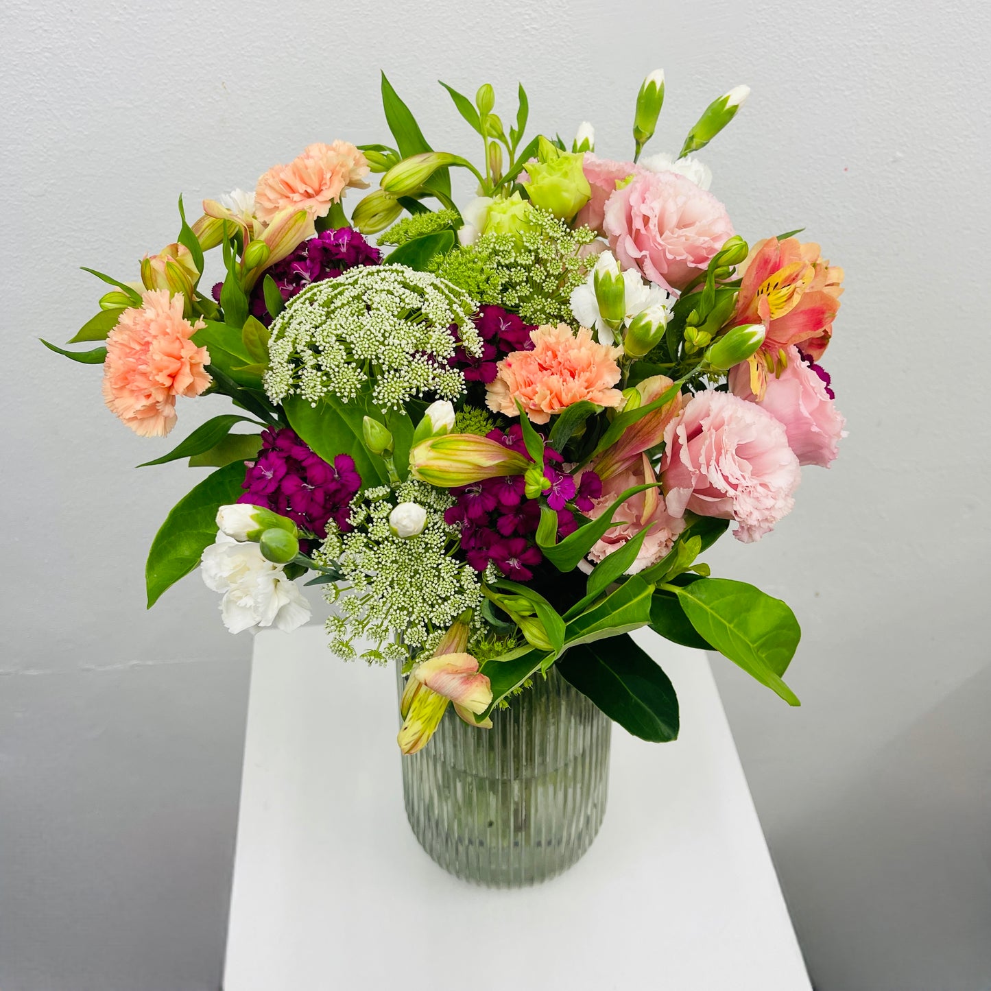 Pastel pink and orange seasonal flowers Melbourne delivery