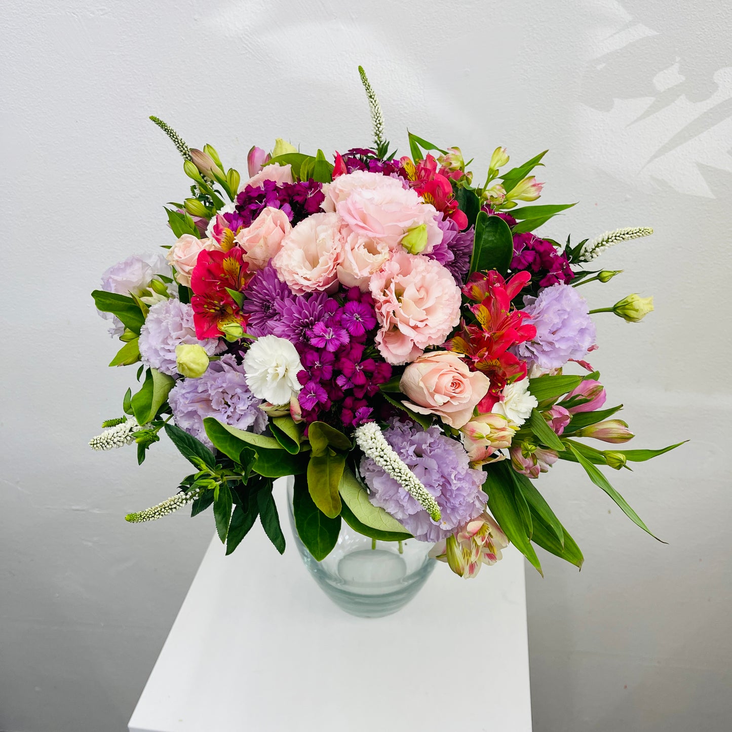 Pink and purple autumn bouquet spiral design – Melbourne flower delivery