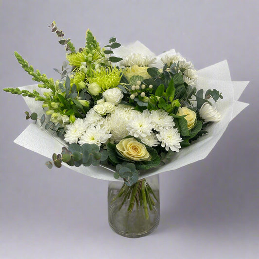 Large white and green flower bouquet with rounded shape, ideal for sympathy or birthday, available for same-day Melbourne delivery.