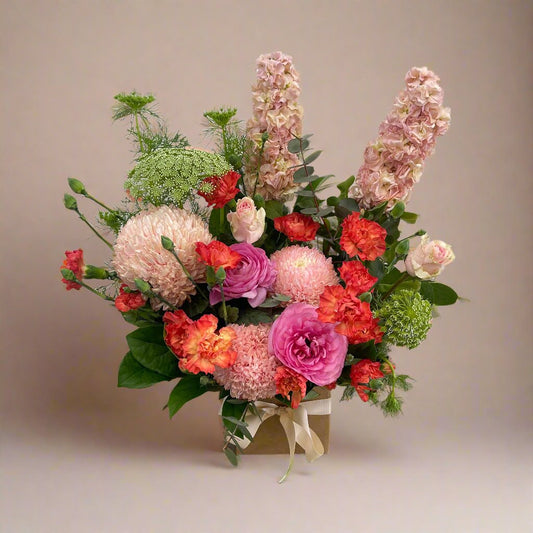 Spring Arrangement No. 03 – vibrant pink flowers in a chic box, available for same-day delivery in Bayside Melbourne.