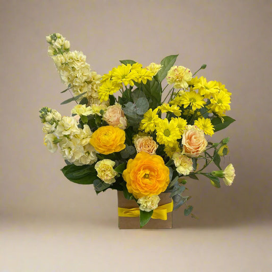 Spring Arrangement No. 04 – vibrant yellow flowers in a stylish box, available for same-day delivery in Bayside Melbourne.