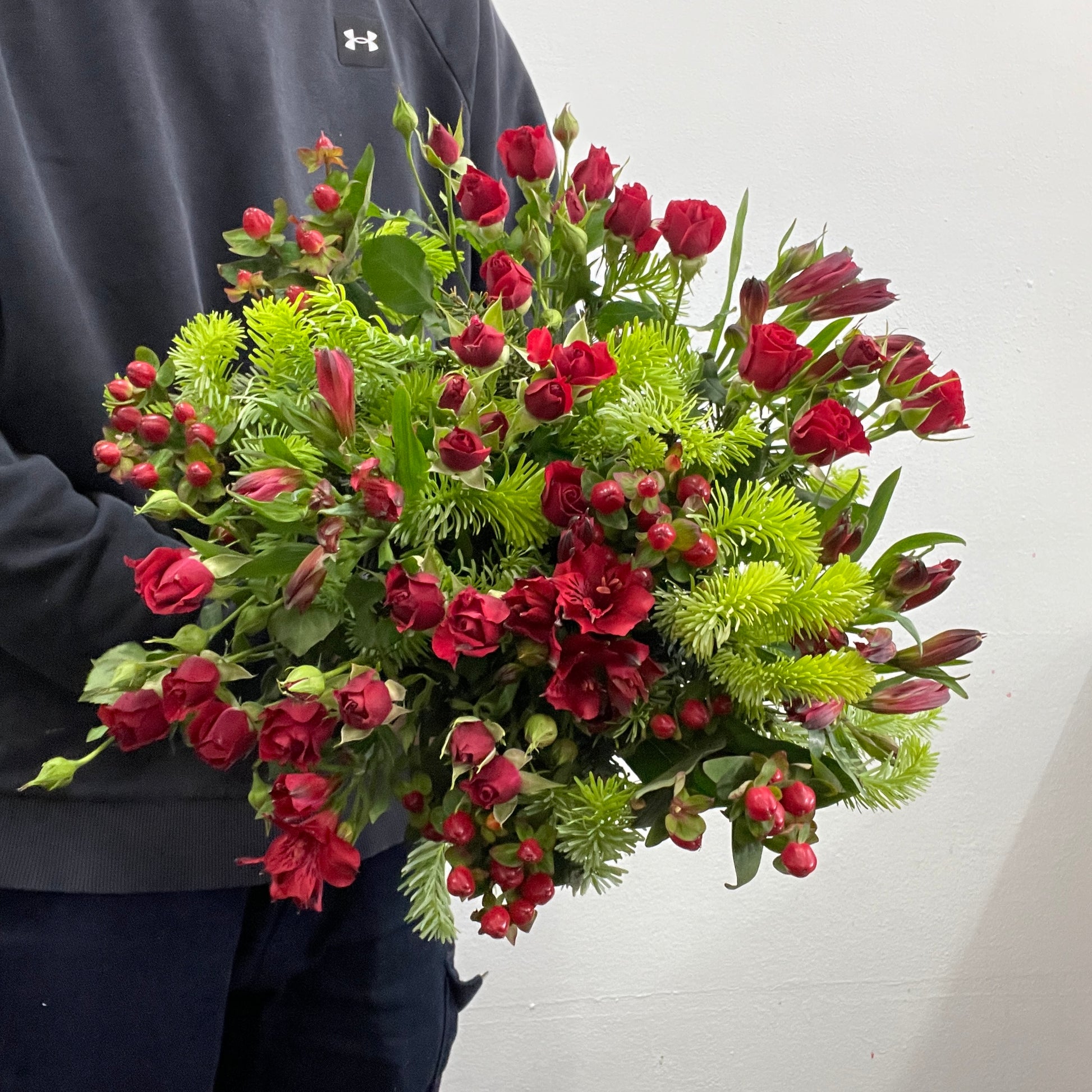 estive red and green Christmas bouquet by Adam The Flower Man