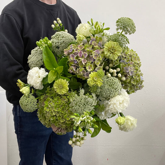 Green and white summer bouquet featuring hydrangeas and Queen Anne’s lace Melbourne flower delivery