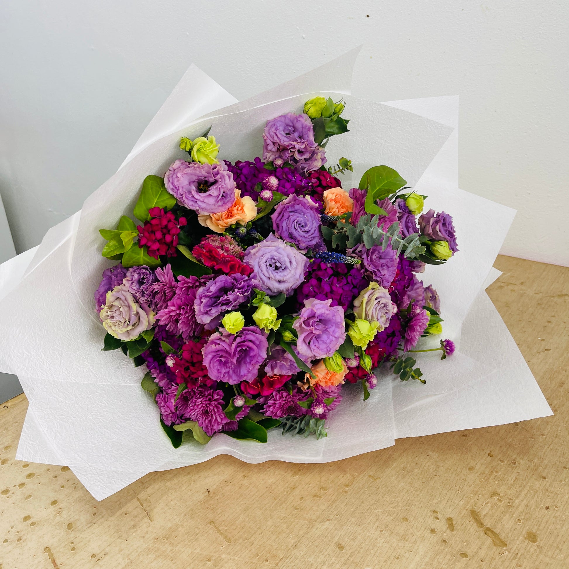 Wild Autumn purple and orange bouquet by Sandringham florist Melbourne